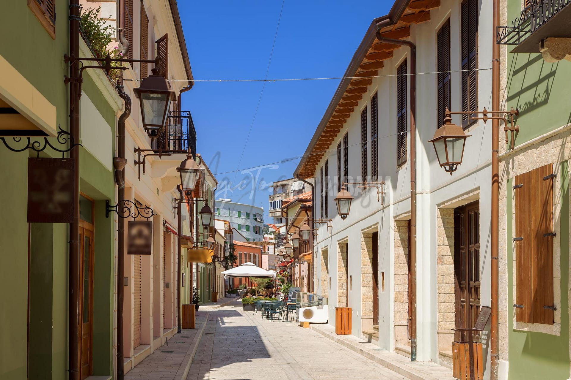 Vlora Typical street in historic center with colorful buildings.
